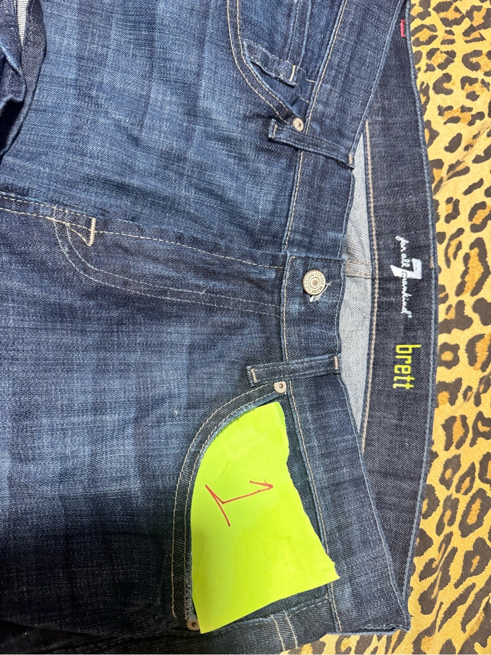 7 For All Mankind Dark Wash Jeans with Light Green Pocket Lining